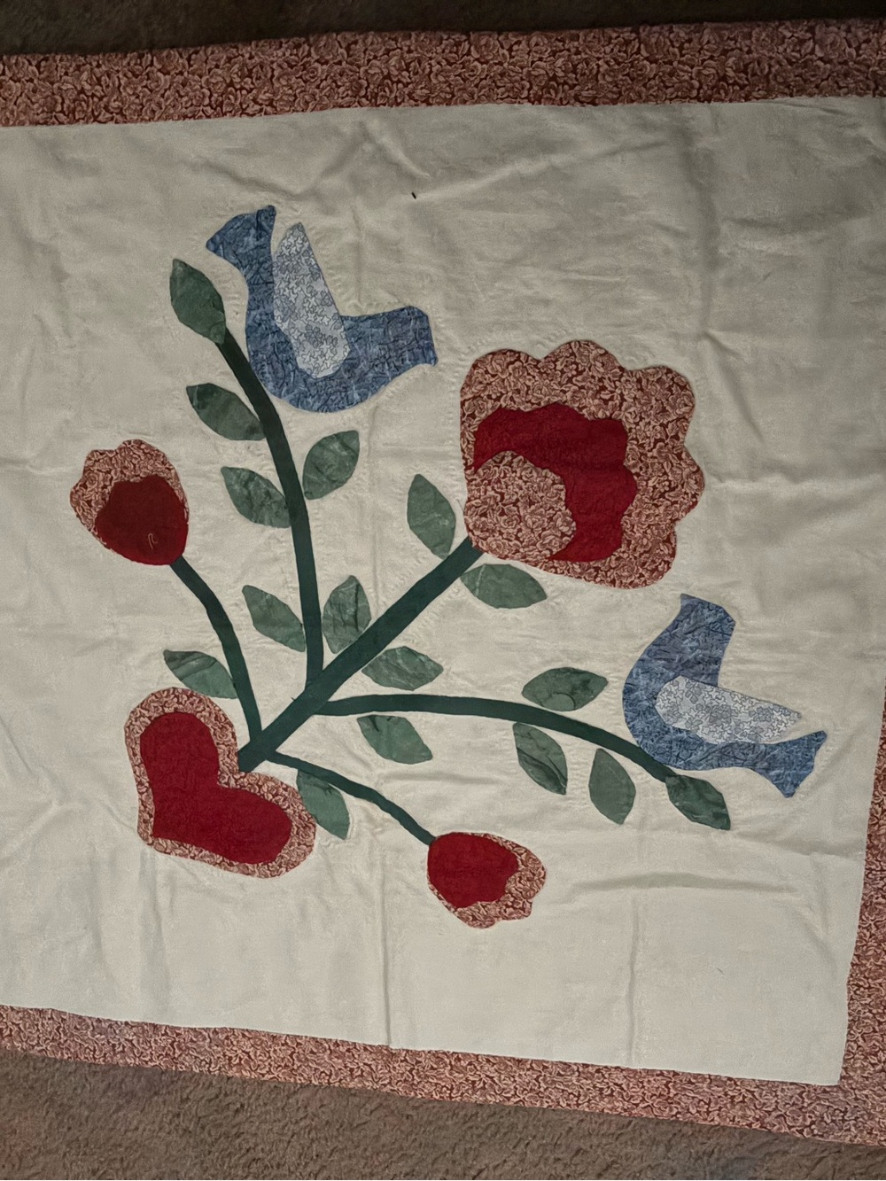 Handmade Cream Floral Appliqué Quilt with Red and Blue Accents